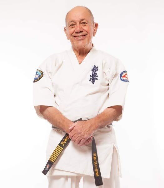 Hanshi Steve Arneil standing in a karate gi
