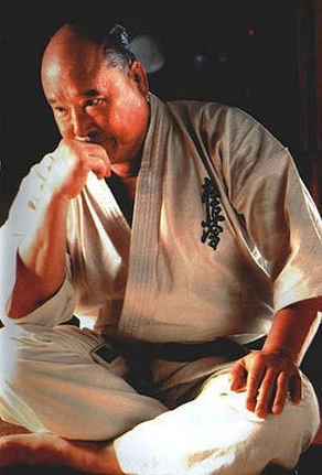Mas Oyama seated in quiet contemplation