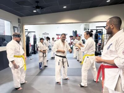 Sensei Omar Covarrubias works with Kyokushin karate students on fighting techniques during the Knockdown Fighting Seminar at Kaizen Kan Dojo in Tucson, Arizona.