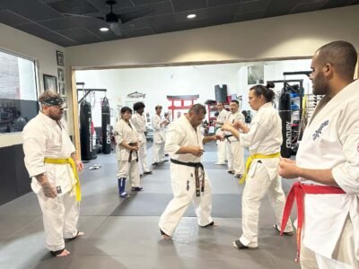 Sensei Omar Covarrubias works with Kyokushin karate students on fighting techniques during the Knockdown Fighting Seminar at Kaizen Kan Dojo in Tucson, Arizona.