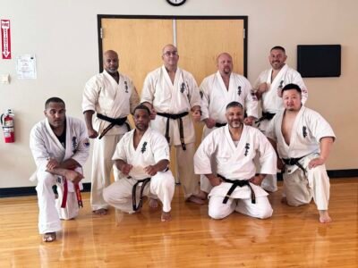 Group photo of Kyokushin karate black belts attending the September 2026 Knockdown Fighting Seminar at Kaizen Kan Dojo in Tucson, Arizona.